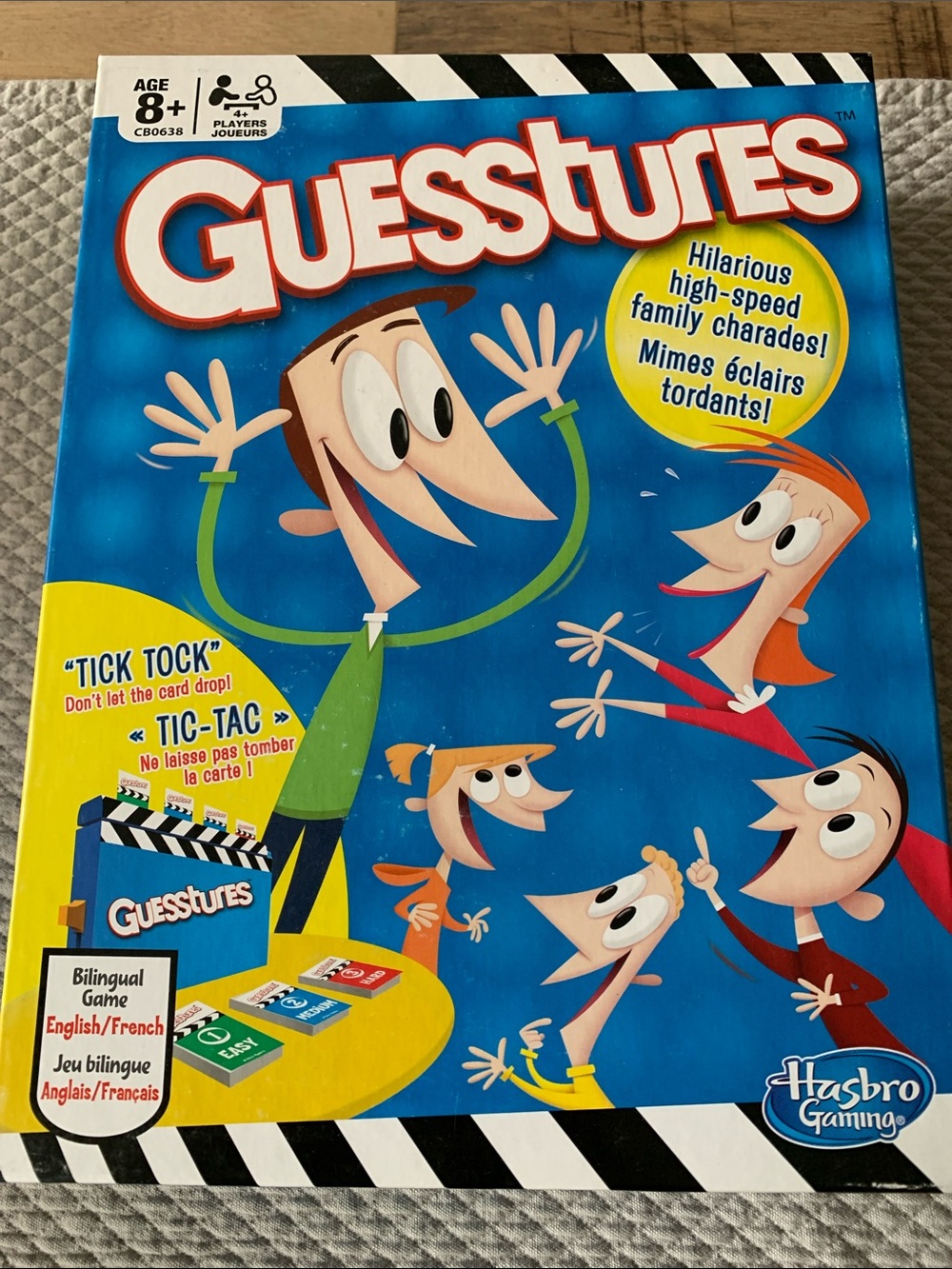 Hasbro Guessstures Family Charades Game - Blue, Red, Yellow, Green
